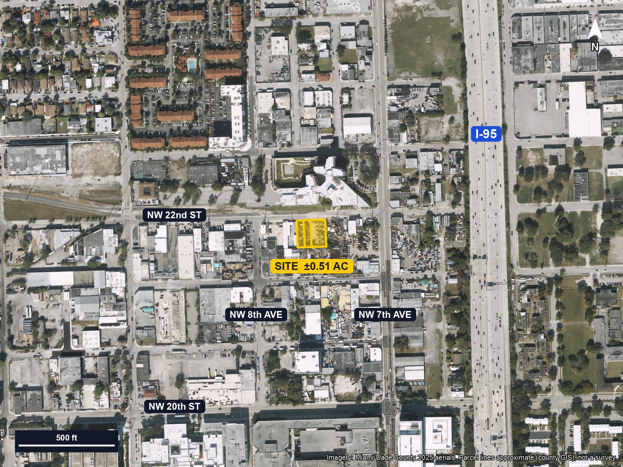 Neighborhood aerial with the site highlighted in yellow
